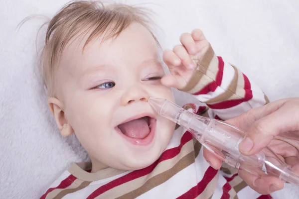 Slem sug med nasal aspiration — Stockfoto