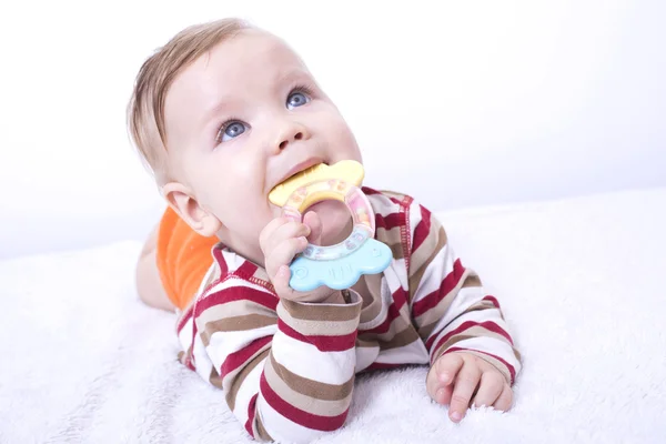 Infant with the teether — Stock Photo, Image