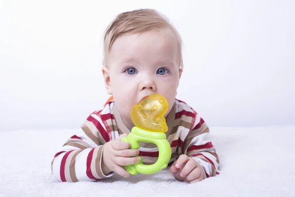 Infant with the teether — Stock Photo, Image