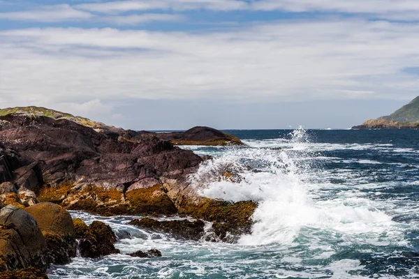 Breaking water at Derrynane Bay — стокове фото