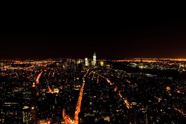 Lower Manhattan at night seen from Empire State Building in New York city, USA