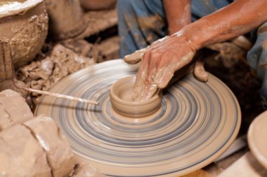 potter, elinde pot aralığına üretildi.