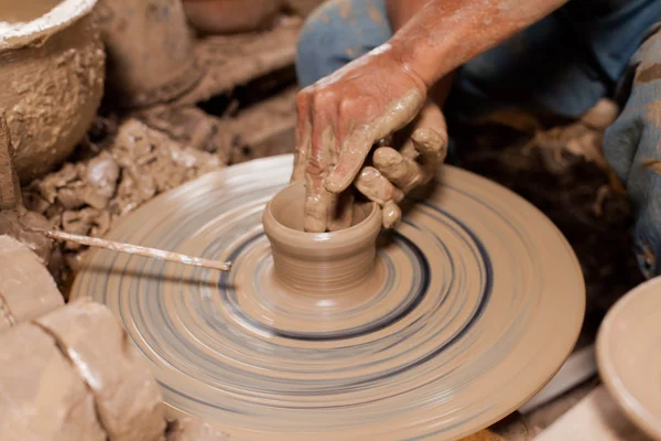 Hands of potter, was produced on range of pot. — Stock Photo, Image