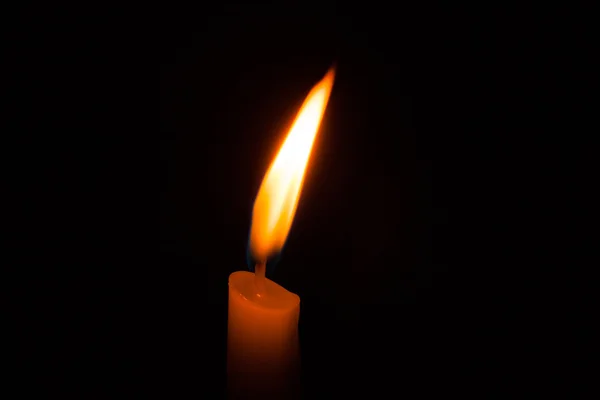 Glowing candles on dark background. — Stock Photo, Image