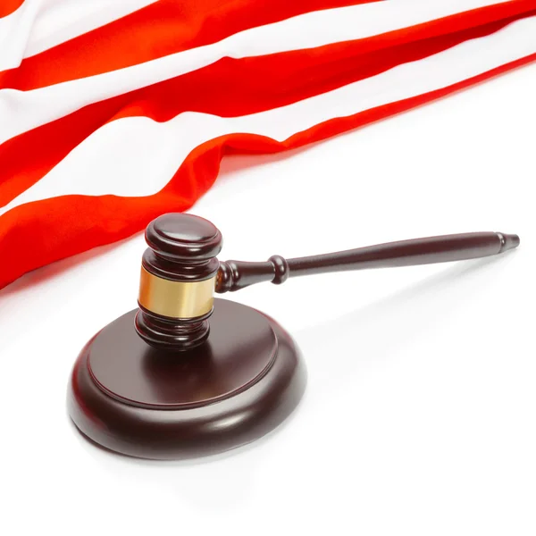 Close up studio shot of a wooden judge gavel near flag of Unites States of America — Stock Photo, Image