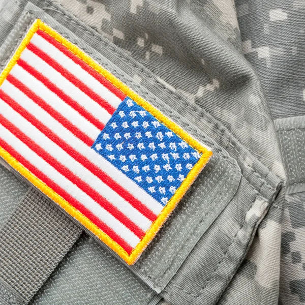 US flag shoulder patch on solder's uniform - close up studio shot — Stock Photo, Image