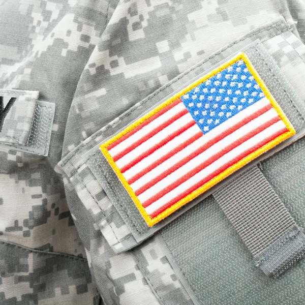 Close up studio shot of US flag shoulder patch on solder's uniform — 스톡 사진