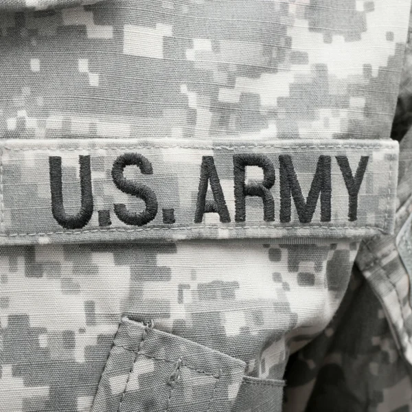Close up studio shot of U.S. ARMY patch attached to military uniform — Stock Fotó