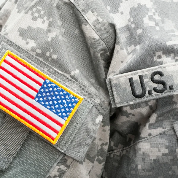 Close up studio shot of US flag and U.S. ARMY patch on military uniform — 图库照片