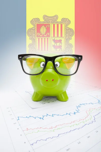 Piggy bank with flag on background - Andorra — Stock Photo, Image