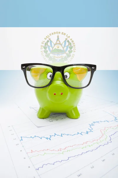 Piggy bank with flag on background - El Salvador — Stock Photo, Image