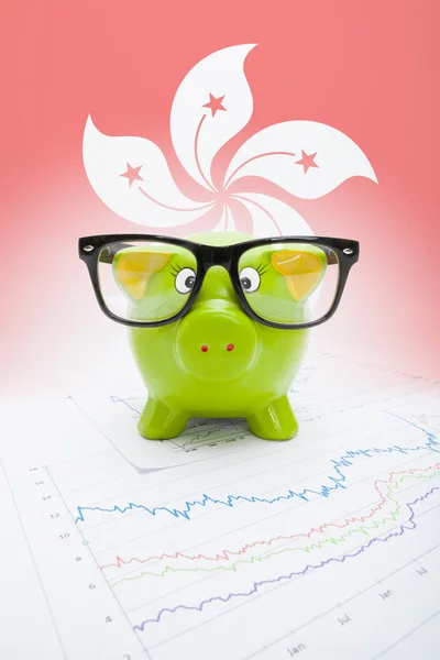 Piggy bank with flag on background - Hong Kong — Stock Photo, Image