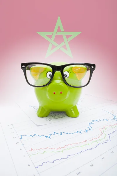 Piggy bank with flag on background - Morocco — Stock Photo, Image