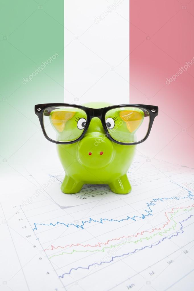 Piggy bank with flag on background - Italy