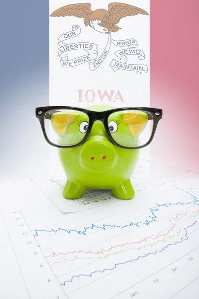 Piggy bank with US state flag on background - Iowa — Stock Photo, Image