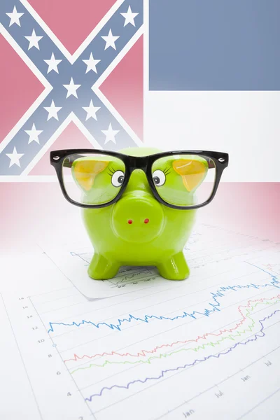 Piggy bank with US state flag on background - Mississippi — Stock Photo, Image