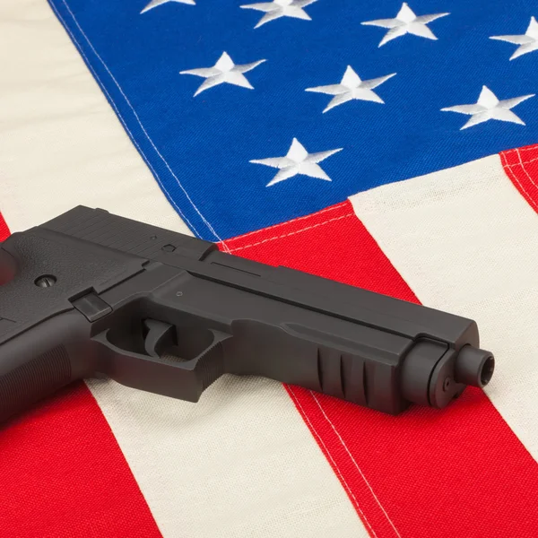 Handgun over USA flag - 1 to 1 ratio — Stock Photo, Image