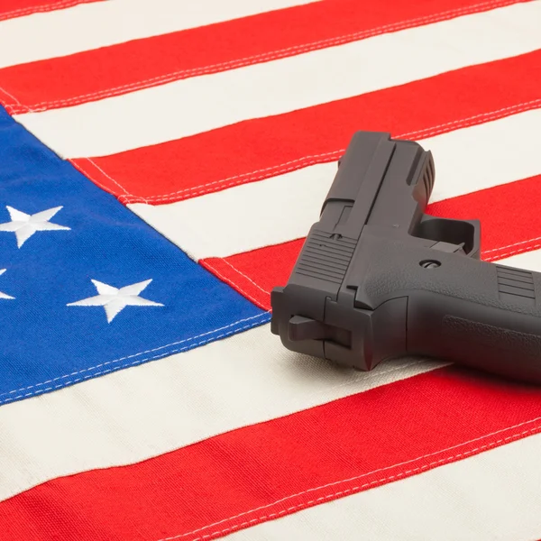 Handgun over USA flag - studio shoot - 1 to 1 ratio — Stock Photo, Image