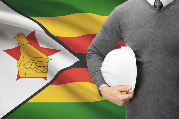 Architect with flag on background  - Zimbabwe — Stock Photo, Image