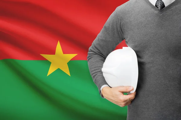 Architect with flag on background  - Burkina Faso — Stock Photo, Image