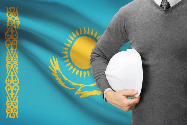 Arkitekt med flaggan i bakgrunden - Kazakstan — Stockfoto