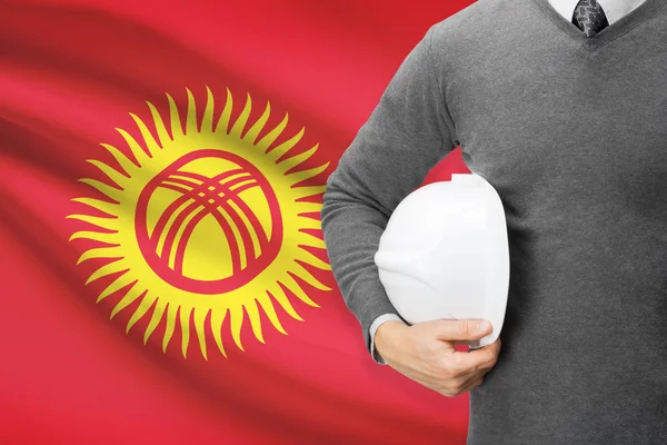 Αρχιτέκτονας με σημαία σε φόντο - Κιργιζιστάν — Φωτογραφία Αρχείου
