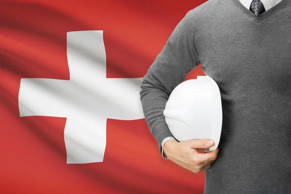 Architect with flag on background  - Switzerland — Stock Photo, Image