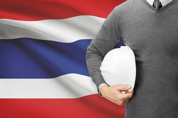 Arkitekt med flaggan i bakgrunden - thailand — Stockfoto