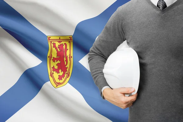 Ingenieur met vlag op achtergrond serie - nova scotia — Stockfoto