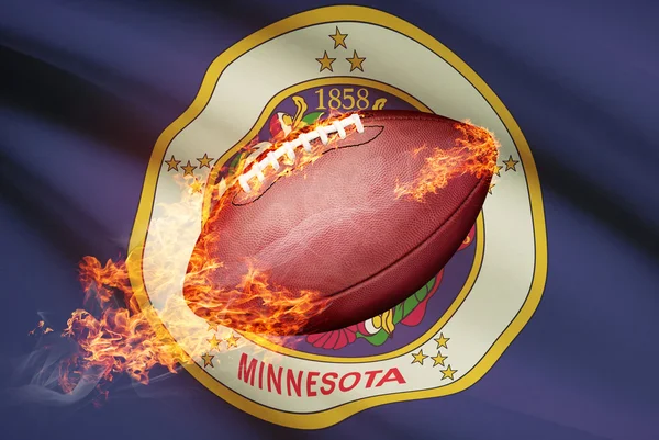 Futbol amerykański piłkę z flagą w backround serii - minnesota — Zdjęcie stockowe