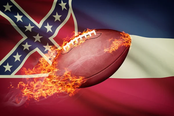 Míč americký fotbal s vlajkou na pozadí řady - mississippi — Stock fotografie