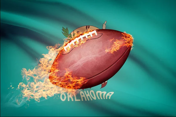 US-amerikanischer American-Football-Ball mit Flagge auf Backround Serie - oklahoma — Stockfoto