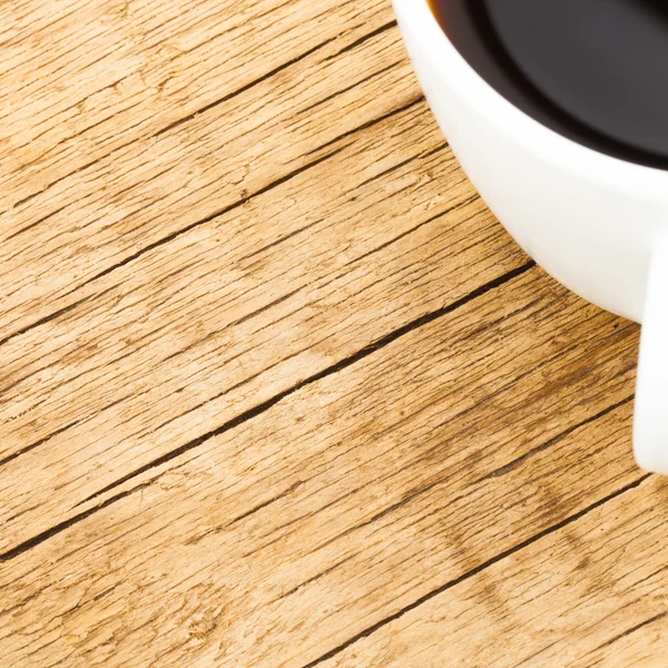 Tazza di caffè su vecchio rapporto di 1 a 1 tavolo in legno - vista dall'alto- — Foto Stock