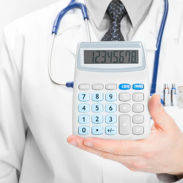 Doctor holdling calculator - heath care concept - 1 to 1 ratio — Stock Photo, Image