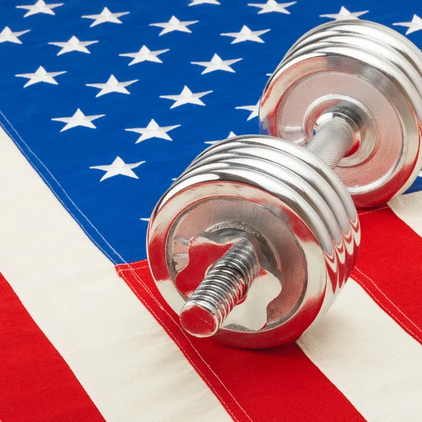 Dumbbell and US flag - 1 to 1 ratio — Stock Photo, Image