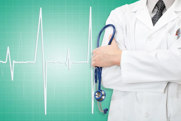 Doctor with stethoscope in hand and electrocardiogram on green background — Stock Photo, Image