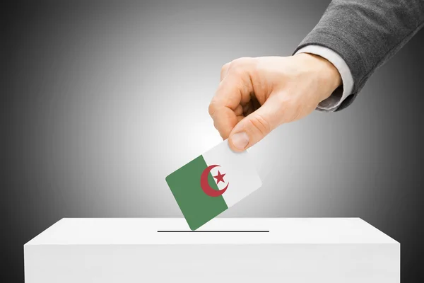 Voting concept - Male inserting flag into ballot box - Algeria — Stock Photo, Image