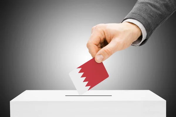 Voting concept - Male inserting flag into ballot box - Bahrain — Stock Photo, Image