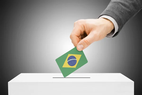 Voting concept - Male inserting flag into ballot box - Brazil — Stock Photo, Image