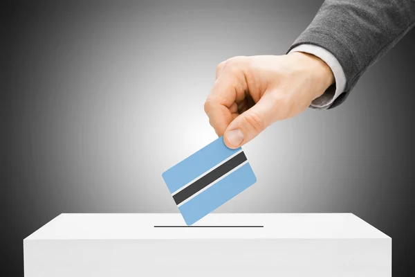 Voting concept - Male inserting flag into ballot box - Botswana — Stock Photo, Image