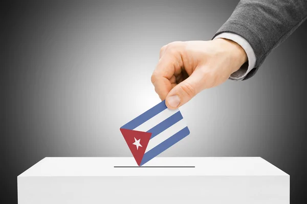 Voting concept - Male inserting flag into ballot box - Cuba — Stock Photo, Image
