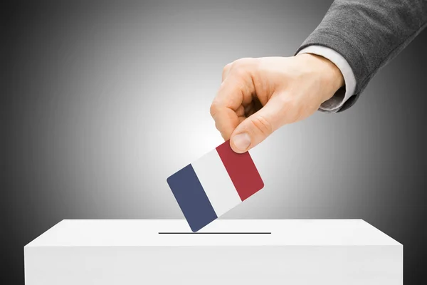 Voting concept - Male inserting flag into ballot box - France — Stock Photo, Image