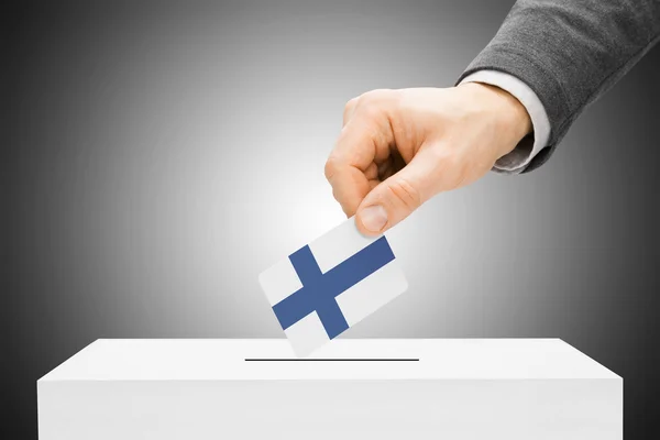 Voting concept - Male inserting flag into ballot box - Finland — Stock Photo, Image