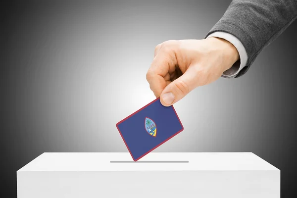 Voting concept - Male inserting flag into ballot box - Guam — Stock Photo, Image