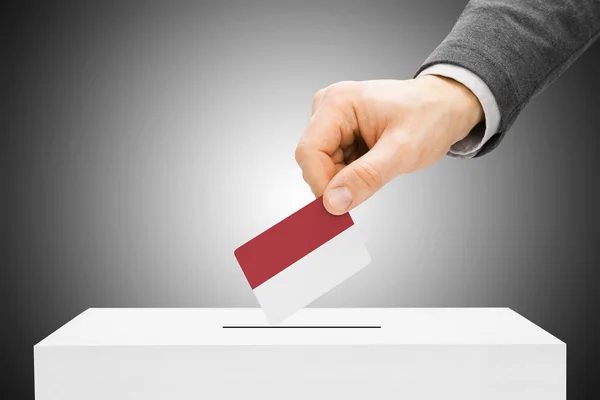 Voto concepto - hombre bandera insertar en urna - Indonesia —  Fotos de Stock