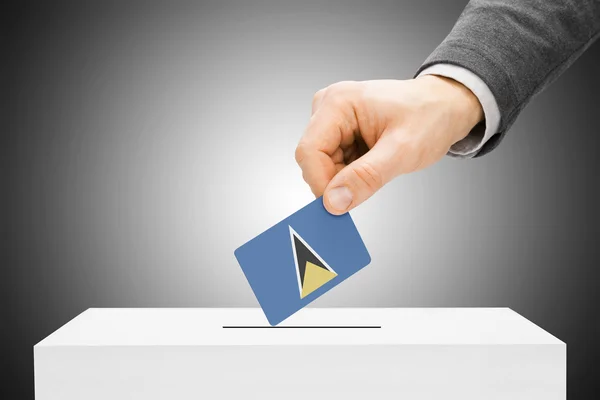 Voto concetto - maschio bandiera inserimento nell'urna - Saint Lucia — Foto Stock