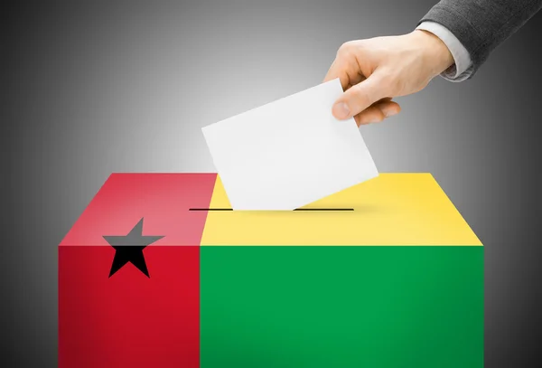 Voting concept - Ballot box painted into national flag colors - Guinea-Bissau — Stock Photo, Image