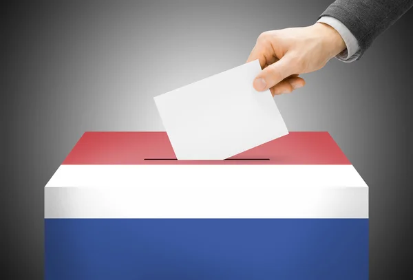 Koncepcja głosowania - urny pomalowane w kolorach flagi narodowej - Holandia — Zdjęcie stockowe