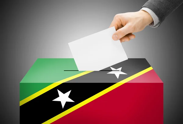 Stimmberechtigten Konzept - Wahlurne gemalt in Nationalflagge Farben - St. Kitts und Nevis — Stockfoto