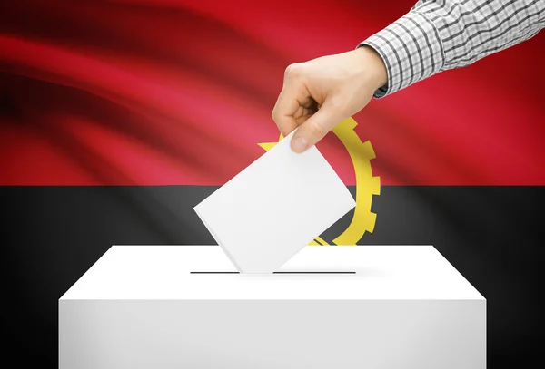 Voting concept - Ballot box with national flag on background - Angola — Stock Photo, Image